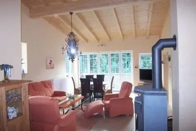 Image de Vacation apartment with natural wood furniture and balcony