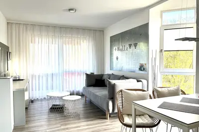 Image de confortable appartement de 2 pièces au 1er Og avec balcon au parc