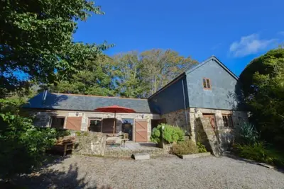 Image de L'un des deux charmants chalets situés dans l'enceinte de Cusgarne House.