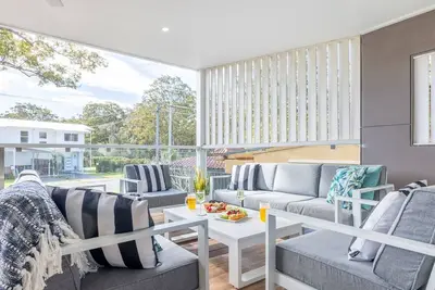 Image de «Idle Days», 3 Achilles St - grande maison avec Wifi, Aircon & Boat Parking