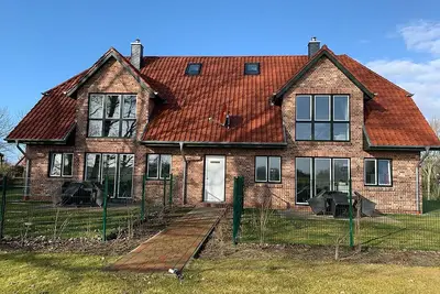 Image de DĂĽnentraum, Ferienwohnung in \"De Feerjenhusen\" am Haubarg von Vollerwiek