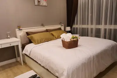 Image de La suite exclusive d'une chambre avec vue sur le jardin à Bangsaen