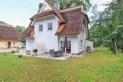 Image de Reetdachhaus Waldidylle