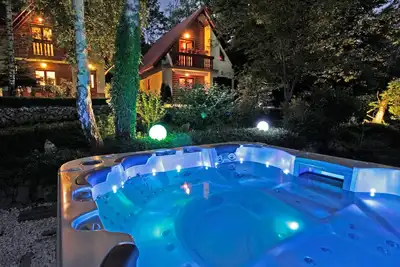 Image de Belle maison à Breze avec jacuzzi