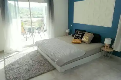 Image de Belle chambre dans une belle villa avec un grand jardin, près de la plage de Friars Bay