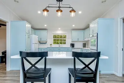 Image de A Nest Above~Lake Home~KingBed~BoatDock~Kayaks~FirePits~All on 12 Acres!