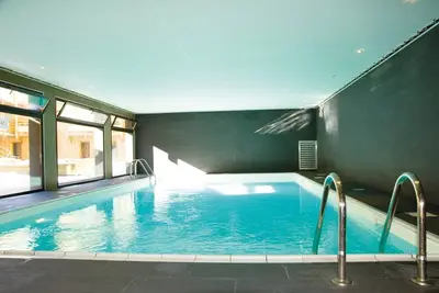 Image de Appartement Alcove 20m du télécabine | Accès piscine + sauna!