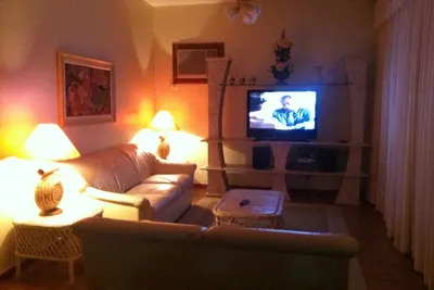 Image de Appartement confortable avec 140 m² Enseada - Guarujá