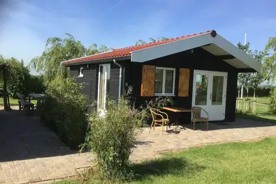 Image de Passez la nuit sur l'eau dans Tiny House \/ Trekkershut Comfort \/ Mini Bungalow