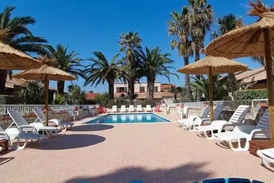Image de Gitelacapelle avec 2 chambres piscine, à 10mm plages sauvages, cadre tropic. . . .