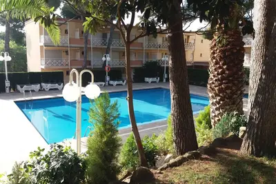 Image de Appartament à côte de la Crique du Pi. Résidence familier. Vue sur piscine.