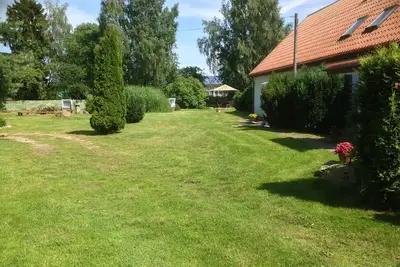 Image de Appartement jusqu'à 5 personnes avec 2 chambres grand jardin adapté aux enfants