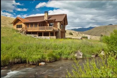 Image de Magnifique Creekside Sun West Ranch Home