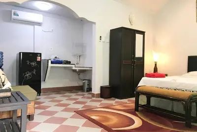 Image de Chambre avec vue sur la piscine. Accès Wifi, cuisine, piscine, à seulement 10 minutes en voiture de la plage de Berawa