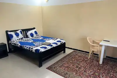 Image de Grande Chambre Climatisee Avec Salon - Wifi- Cuisine