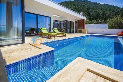 Image de Villa lune de miel à Kalkan Üzümlü Piscines extérieure / intérieure avec option chauffage