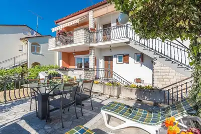 Image de Apartment Loredana with Terrace and Shared Garden