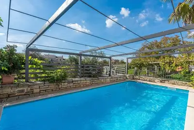 Image de Holiday apartment Peresiji Aua with shared pool