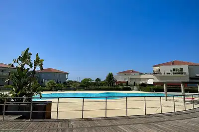 Image de Appartement Juan Riviera 2p standing accès mer terrasse, jardin privatif, clim