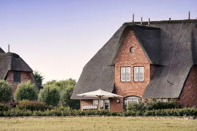 Image de SalzWasserHerz Senhoog Luxury Holiday Homes ***** - Maison de vacances de luxe SalzWasserHerz