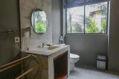 Image de Chambre privée Dlx pour vous, détendez-vous dans notre piscine avec une atmosphère balinaise