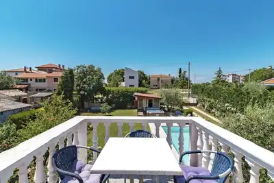 Image de Maison de vacances privée avec Wifi, bain à remous, piscine privée, climatisation, Tv, patio