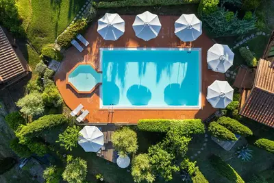 Image de Appartement avec piscine, climatisation, Wifi, Tv, terrasse, vue panoramique, près de San Gimignano