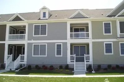Image de Votre Maison Loin De La Maison À BAYSIDEpour tous les amateurs de golf et de plage