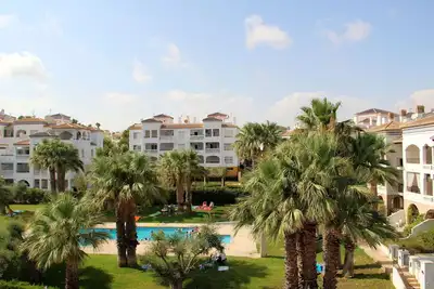 Image de Superbe appartement de 2 chambres sur Villamartin Plaza récemment rénové face à la piscine communale