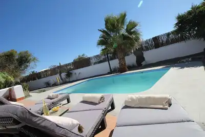 Image de Stylish and serene south facing bungalow with private garden and pool.