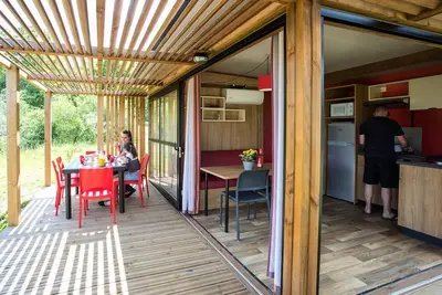 Image de Chalet Noumea (4-5 pers) 2 Schlafzimmer - Tv - Clim - 2 Liegestühle - überdachte Terrasse 5 Personen