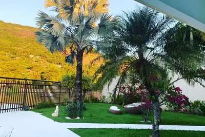 Image de Maison au bord du lac, située sur une île à Barra da Tijuca sur la rivière jameiro