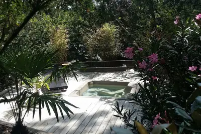 Image de Grand Chalet 90m2 à 8 min de l’Océan avec jacuzzi,