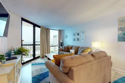 Image de Magnifique condo en bord de mer avec piscine partagée et accès à la plage