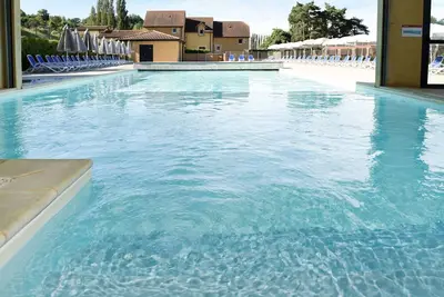 Image de Appartement dans une maison de vacances avec piscine, Wifi, Tv, terrasse, animaux admis, parking