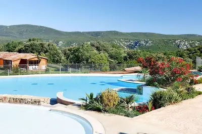 Image de Appartement dans une maison de vacances avec bain à remous, piscine, Wifi, climatisation, terrasse
