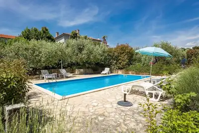 Image de Confortable appartement avec piscine, climatisation, Wifi, Tv, terrasse, animaux admis et parking