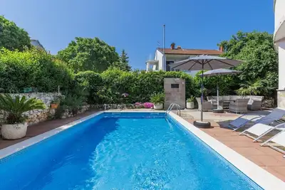 Image de Agréable appartement avec piscine, climatisation, Wifi, Tv, patio, animaux admis et parking