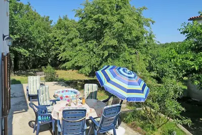 Image de Agréable appartement dans une maison de vacances avec Wifi, Tv, terrasse, animaux admis, parking