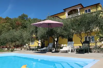 Image de Confortable appartement avec piscine privée, Wifi, climatisation, Tv, patio et parking