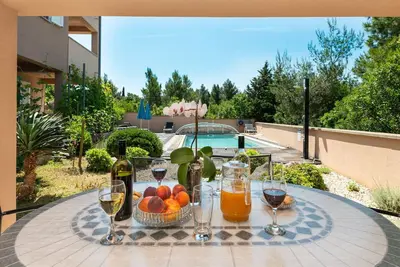 Image de Agréable appartement pour 6 personnes avec Wifi, climatisation, piscine, Tv, terrasse et parking