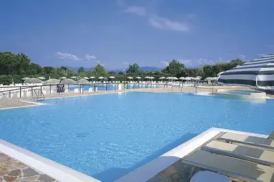Image de Appartement dans une maison de vacances avec Wifi, climatisation, piscine, Tv, terrasse, parking