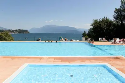 Image de Confortable appartement dans une maison de vacances avec Wifi, piscine, terrasse et parking
