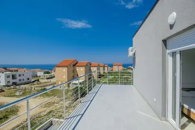 Appartement de deux chambres avec la terrasse et la vue sur le mer Novalja, Pag (A-17954-h)
