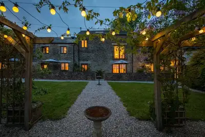 Image de The Threshing Barn - Conversion de grange de luxe familiale de 3 chambres près de Looe