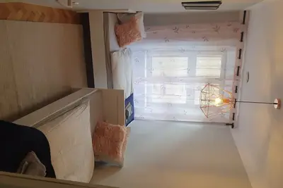 L'appartement est situé dans une ancienne maison d'habitation.