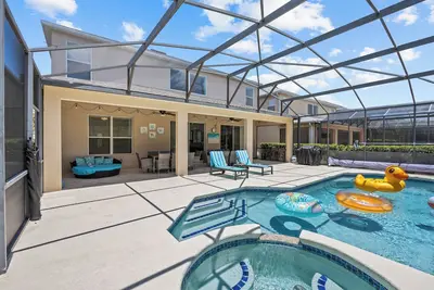 Image de 8br / 4. Maison de luxe 5ba avec piscine et spa orientés sud privés près de Disney