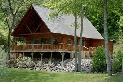 Image de Creek Front Family Getaway dans les Great Smoky Mountains avec bain Ă remous