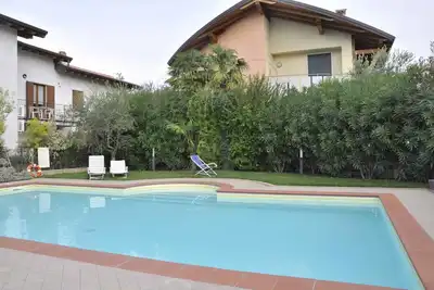 Image de Appartement de vacances Rez-de-chaussée avec piscine et climatisation