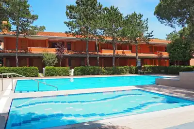 Image de Joli appartement avec climatisation, piscine, Wifi, Tv, terrasse et animaux admis